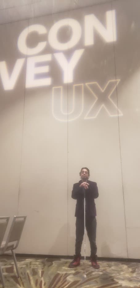 Ricardo Rodriguez presenting at ConveyUX Seattle, a conference focused on user experience and accessibility.